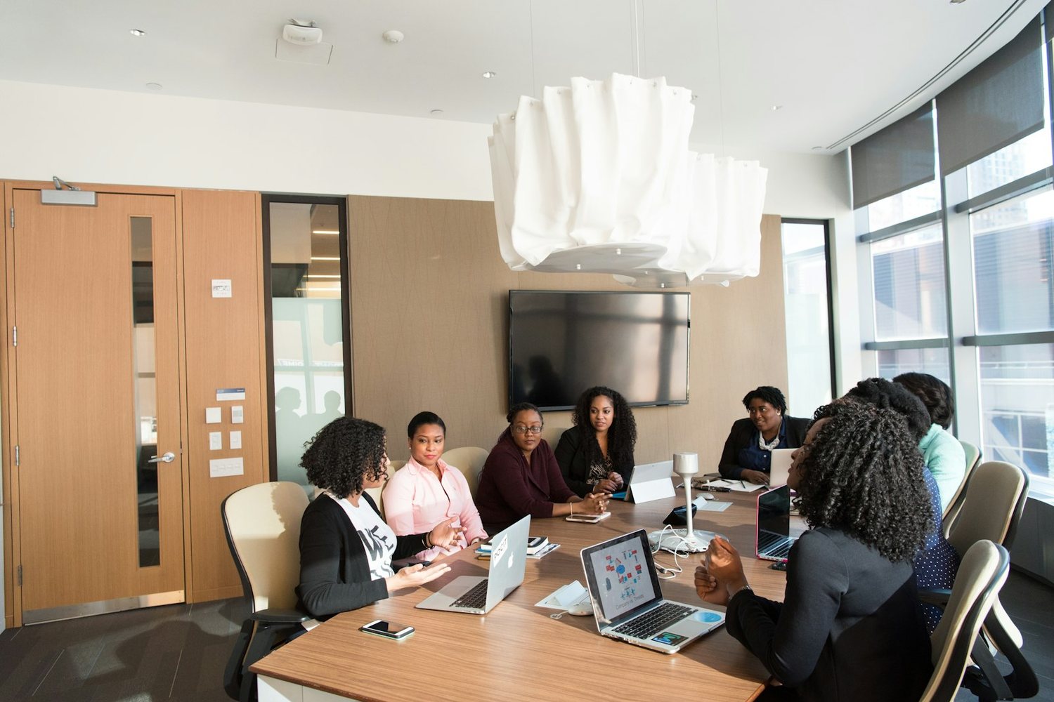 Colleagues working together in an open office