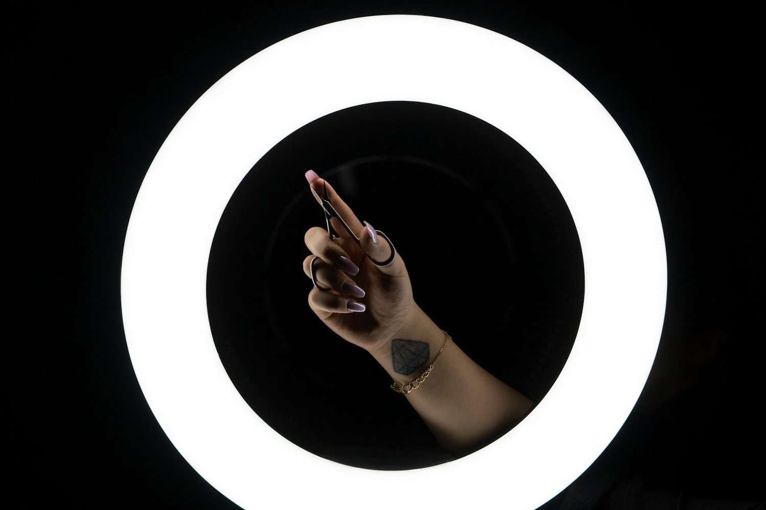 Ring light glowing in a dark studio