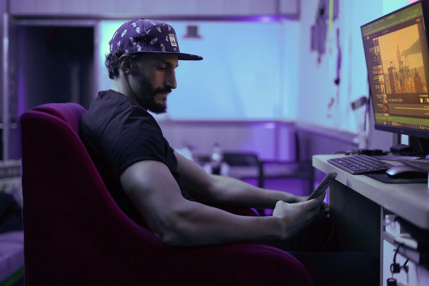 Editor at a multi-screen edit suite