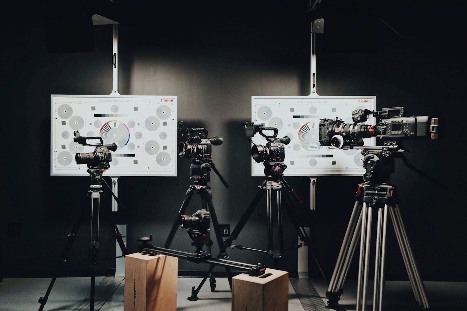 Cameras on tripods in a studio